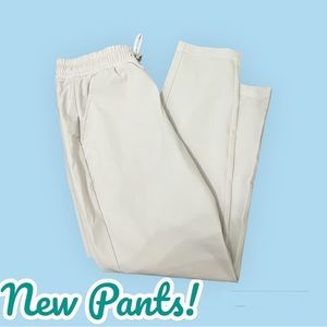 Stretch woven taper pants